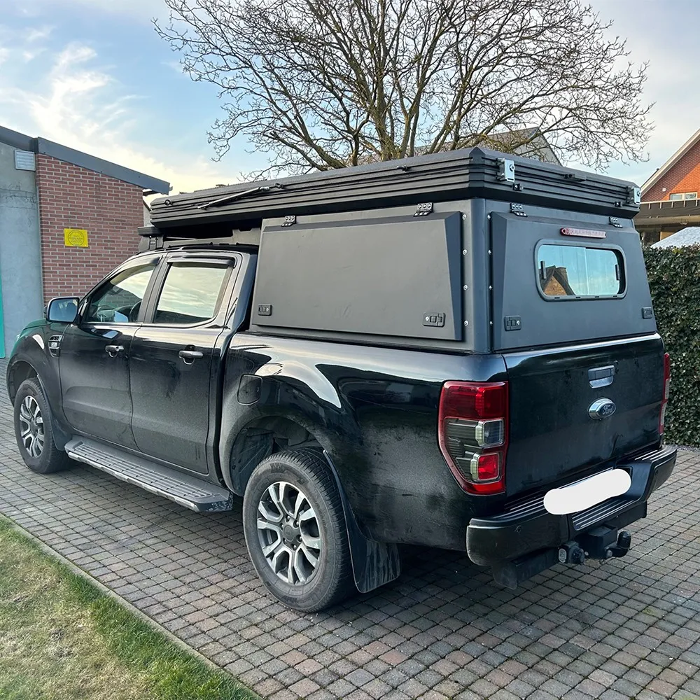 black ford ranger with pop up canopy camper