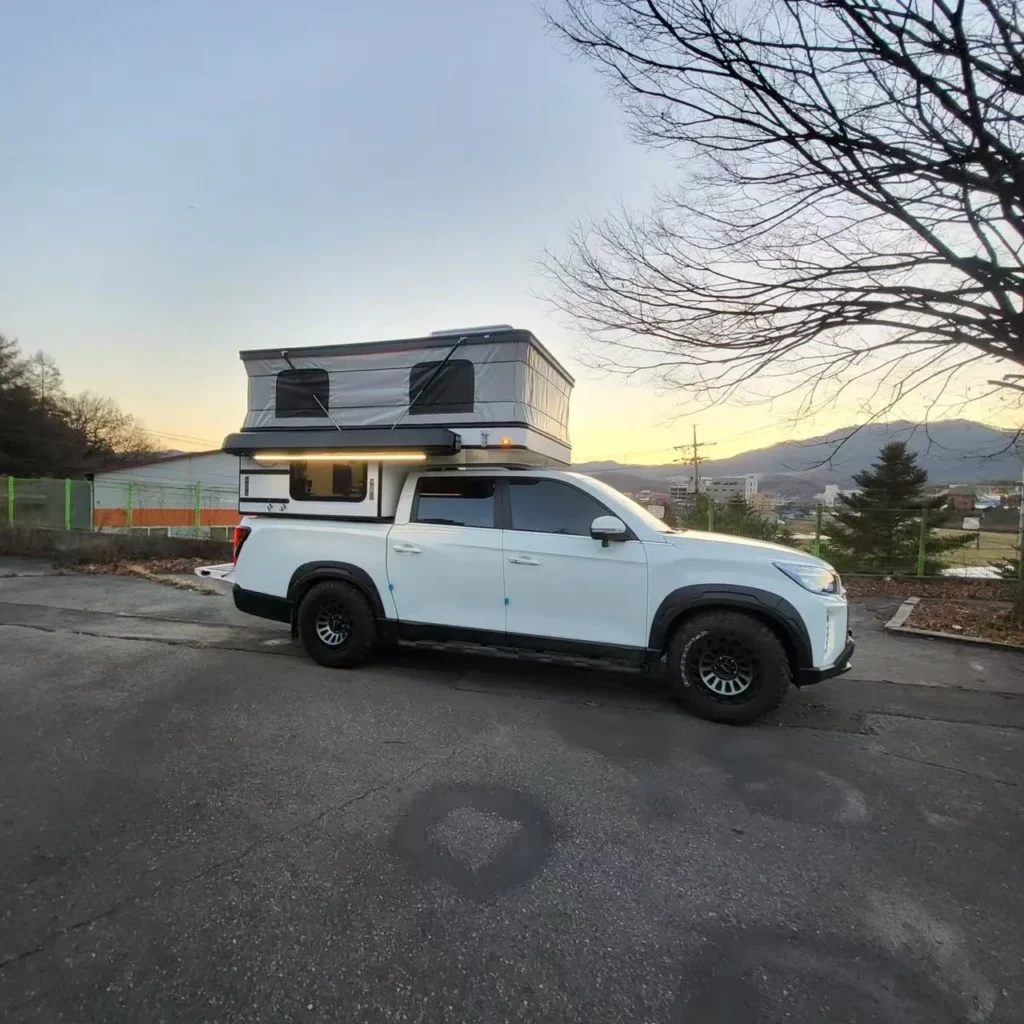 white pickup truck with color matched hardtop canopy