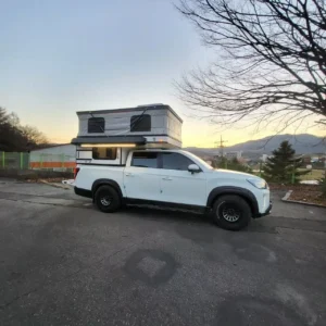 white pickup truck with color matched hardtop canopy